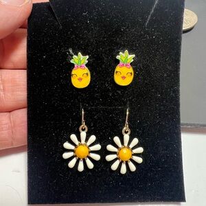 Fun set of pierced earrings. Enamel daisy hoop and funny pineapple studs.